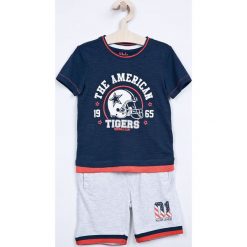 Blukids - Dres dziecięcy 98-128 cm. Niebieskie spodnie chłopięce Blukids, bez wzorów, z bawełny. W wyprzedaży za 49,90 zł.