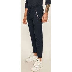 Tommy Jeans - Spodnie. Niebieskie spodnie męskie Tommy Jeans, s, bez wzorów, z elastanu. Za 449,90 zł.