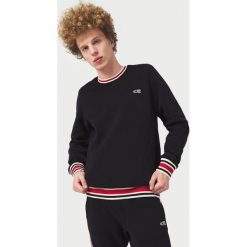 O'Neill Essentials Bluza Czarny. Czarne bluzy męskie O'Neill, xxl, bez wzorów, z bawełny, bez kołnierzyka, bez rękawów, bez kaptura. Za 274,95 zł.