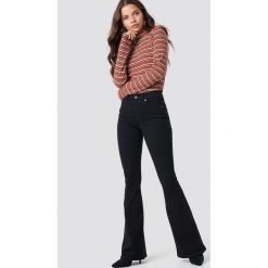 Dr Denim Rozszerzane jeansy Macy - Black. Czarne spodnie damskie z wysokim stanem marki Dr.Denim, z podwyższonym stanem. Za 202,95 zł.