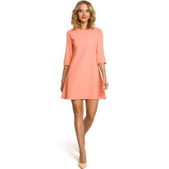 JENNA Trapezowa tunika - koralowa. Pomarańczowe sukienki damskie Moe, s, bez wzorów, z materiału, eleganckie, bez kołnierzyka, bez rękawów, trapezowe. Za 109,90 zł.