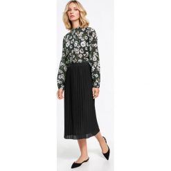 Plisowana spódnica. Czarne spódnice wieczorowe marki GERRY WEBER EDITION, z dzianiny, midi. Za 109,00 zł.