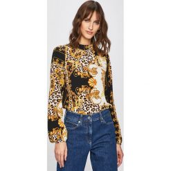 Vero Moda - Bluzka. Czarne bluzki damskie Vero Moda, na co dzień, s, bez wzorów, z poliesteru, casualowe, ze stójką, bez rękawów. W wyprzedaży za 119,90 zł.