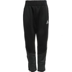 Adidas Performance STRIKER Spodnie treningowe black/carbon/reflectivesilver. Różowe spodnie chłopięce marki adidas Performance, z dzianiny, z okrągłym kołnierzem. Za 149,00 zł.