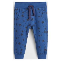 Mango Kids - Spodnie dziecięce Mateo 80-104 cm. Żółte spodnie chłopięce Mango Kids, bez wzorów, z bawełny, casualowe. Za 45,90 zł.