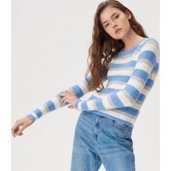Dzianinowy sweter w paski - Niebieski. Niebieskie swetry damskie Sinsay, s, w paski, z dzianiny, bez rękawów, bez kaptura. W wyprzedaży za 29,99 zł.