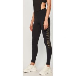LaBellaMafia - Legginsy. Czarne spodnie damskie LABELLAMAFIA, s, z nadrukiem, z elastanu. Za 229,90 zł.