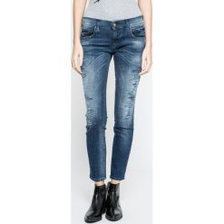 Diesel - Jeansy Gruppe-Ankle. Niebieskie jeansy damskie slim marki Diesel, z aplikacjami, z elastanu, z obniżonym stanem. W wyprzedaży za 429,90 zł.