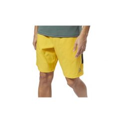 Szorty i Bermudy Reebok Sport Spodenki Woven. Żółte bermudy męskie Reebok Sport, xl, bez wzorów, sportowe. Za 139,00 zł.