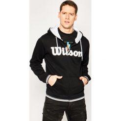 Bluza Wilson Team Script Fz Hoody WRA765901. Czarne bluzy męskie Wilson, m, bez wzorów, z bawełny, bez kołnierzyka, bez rękawów, bez kaptura. W wyprzedaży za 149,00 zł.