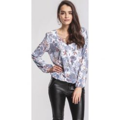 Niebieska Bluzka Printed. Niebieskie bluzki damskie other, z aplikacjami, bez kołnierzyka, z długim rękawem. Za 39,99 zł.