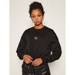 Bluza Calvin Klein Jeans Badge Interlock J20J214208. Czarne bluzy damskie Calvin Klein Jeans, xl, bez wzorów, z jeansu, bez rękawów, bez kaptura. Za 399,00 zł.