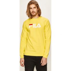 Fila - Bluza. Żółte bluzy męskie Fila, s, z nadrukiem, z bawełny, z okrągłym kołnierzem, bez rękawów, bez kaptura. W wyprzedaży za 199,90 zł.