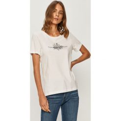 Tommy Hilfiger - T-shirt. Białe topy damskie TOMMY HILFIGER, s, z nadrukiem, z bawełny, casualowe, z okrągłym kołnierzem. Za 139,90 zł.