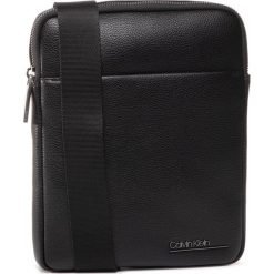 Saszetka CALVIN KLEIN - Ck Bombe' Flat Crossover K50K505517 BAX. Czarne torby męskie skórzane Calvin Klein, bez wzorów, ze skóry ekologicznej, młodzieżowe. W wyprzedaży za 249,00 zł.
