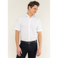 Koszula Boss Elio 50427530. Niebieskie koszule męskie Boss, m, bez wzorów, z bawełny, casualowe, bez kołnierzyka, bez rękawów. W wyprzedaży za 249,00 zł.