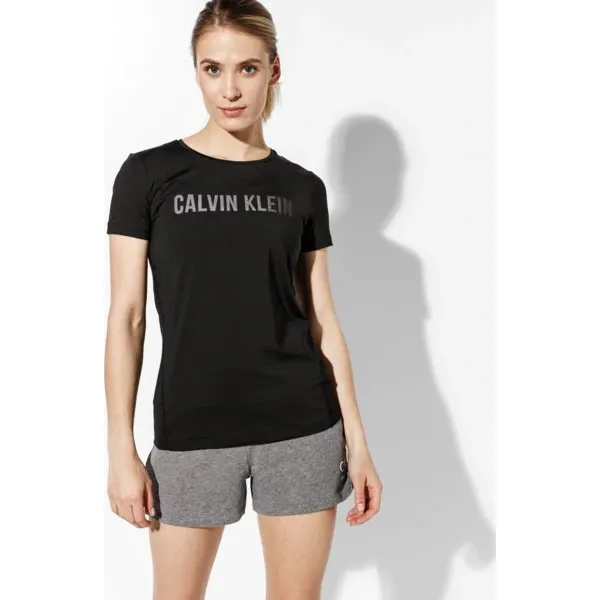 Calvin Klein Koszulka , czarny, rozmiar XS. Czarne koszulki damskie Calvin Klein, s, bez wzorów, z poliesteru, bez kołnierzyka, bez rękawów. W wyprzedaży za 179,99 zł.