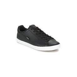 Buty Hummel CROSS COURT LEATER. Czarne trampki i tenisówki damskie Hummel, bez wzorów, bez zapięcia. Za 279,30 zł.