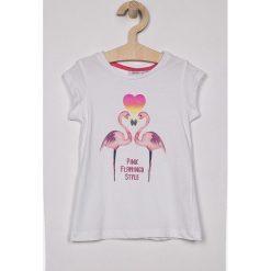Blukids - Top dziecięcy 98-128 cm. Białe bluzki dziewczęce Blukids, z nadrukiem, z bawełny, z okrągłym kołnierzem, z krótkim rękawem, krótkie, bez kaptura. W wyprzedaży za 19,90 zł.