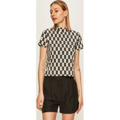 Calvin Klein Jeans - T-shirt. Czarne bluzki damskie Calvin Klein Jeans, s, bez wzorów, z elastanu, casualowe, z golfem, z krótkim rękawem. W wyprzedaży za 219,90 zł.