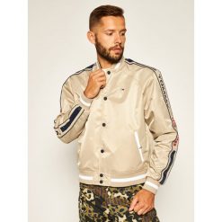 Kurtka bomber Tommy Jeans Tjm Reversible DM0DM07793. Brązowe kurtki męskie Tommy Jeans, s, bez wzorów, z jeansu, bez kaptura. W wyprzedaży za 629,00 zł.