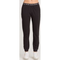 SPODNIE LIU JO SPORT. Czarne spodnie damskie Liu Jo Sport, s, z dresówki. Za 349,30 zł.
