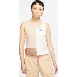 Nike Sportswear Icon Clash Podkoszulek Beżowy. Brązowe podkoszulki damskie Nike, l, z nadrukiem, z bawełny, bez kołnierzyka. Za 137,95 zł.