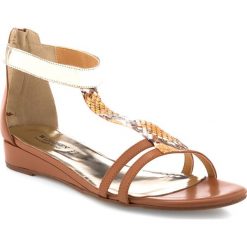 Buty damskie 84-D-403-5. Koturny damskie Wittchen. Za 199,90 zł.