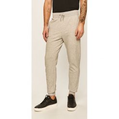 Guess Jeans - Spodnie. Czarne spodnie męskie Guess Jeans, s, z aplikacjami, z elastanu. W wyprzedaży za 219,90 zł.