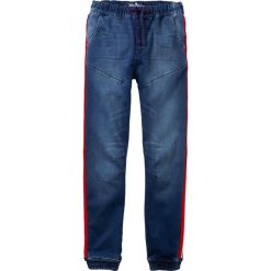 Dżinsy dresowe z lampasami bonprix niebieski "stone”. Niebieskie dresy chłopięce bonprix, bez wzorów, z jeansu, sportowe. Za 59,99 zł.
