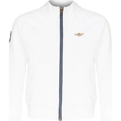 Bluza AERONAUTICA MILITARE. Białe bluzy damskie Aeronautica Militare, z aplikacjami, z tkaniny, bez rękawów, bez kaptura. W wyprzedaży za 595,00 zł.