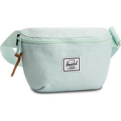 Saszetka nerka HERSCHEL - Fourteen 10514-02457 Glacier. Zielone nerki damskie marki Herschel, bez wzorów, z materiału, młodzieżowe, bez dodatków. Za 129,00 zł.