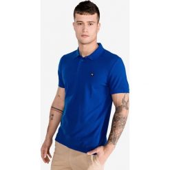 Calvin Klein Polo Koszulka Niebieski. Niebieskie podkoszulki męskie Calvin Klein, l, bez wzorów, z bawełny, polo, bez rękawów. Za 292,95 zł.