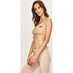 Reebok Classic - Biustonosz sportowy x Gigi Hadid. Brązowe biustonosze sportowe damskie Reebok Classic, s, bez wzorów, z elastanu. W wyprzedaży za 139,90 zł.