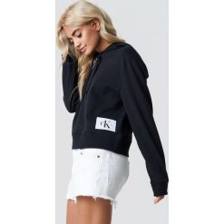 Calvin Klein Bluza z kapturem Harrisom True Icon - Black. Czarne bluzy rozpinane damskie Calvin Klein, z aplikacjami, z dzianiny, z kapturem. Za 404,95 zł.