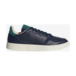 Adidas Originals Supercourt Tenisówki Niebieski. Niebieskie trampki męskie adidas Originals, bez wzorów, ze skóry, bez zapięcia. Za 430,95 zł.