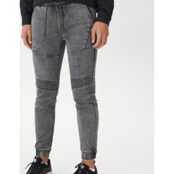Spodnie jogger slim - Szary. Szare spodnie męskie House, m, bez wzorów, z jeansu. Za 139,99 zł.