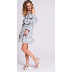 Naoko - Sukienka Tulum X Edyta Górniak. Białe sukienki damskie marki NAOKO, na co dzień, m, bez wzorów, z poliesteru, casualowe, bez kołnierzyka, bez rękawów, mini, proste. W wyprzedaży za 129,90 zł.