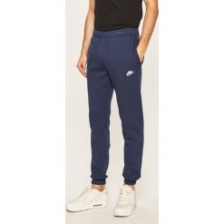 Nike Sportswear - Spodnie. Niebieskie spodnie męskie Nike Sportswear, m, bez wzorów, z dzianiny. W wyprzedaży za 139,90 zł.