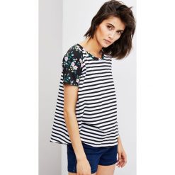 Bluzka typu oversize. Czarne bluzki damskie Moodo, m, bez wzorów, bez kołnierzyka, bez rękawów. Za 9,99 zł.