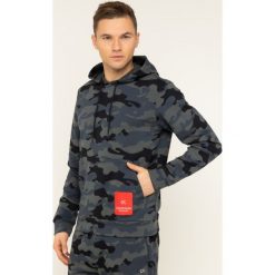 Bluza Calvin Klein Performance 00GMH9W362. Szare bluzy męskie Calvin Klein Performance, m, bez wzorów, z bawełny, bez kołnierzyka, bez rękawów, bez kaptura. W wyprzedaży za 349,00 zł.