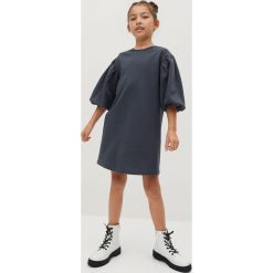 Mango Kids - Sukienka dziecięca Tina 110-164 cm. Różowe sukienki dziewczęce Mango Kids, bez wzorów, z bawełny, z długim rękawem, długie, mini, proste. W wyprzedaży za 45,99 zł.