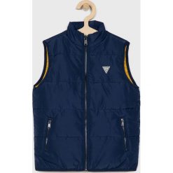 Guess Jeans - Kamizelka dziecięca 118 - 175 cm. Niebieskie kurtki chłopięce z aplikacjami, z poliesteru. W wyprzedaży za 179,90 zł.