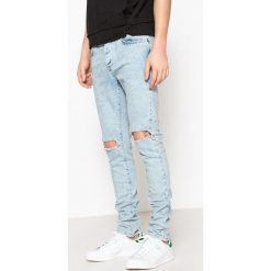 Dżinsy slim, podniszczony styl. Niebieskie jeansy męskie slim marki La Redoute Collections. Za 176,36 zł.