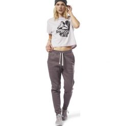 EL MARBLE PANT ALMGRE. Szare spodnie damskie Reebok, na wiosnę, bez wzorów, z polaru, na fitness i siłownię. Za 125,99 zł.