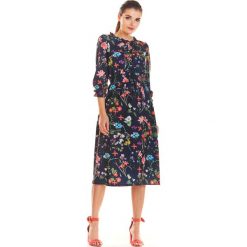 Sukienka midi w kwiaty z gumką w pasie - s. Sukienki damskie e-margeritka.pl, s, w kwiaty, z poliesteru, eleganckie, z długim rękawem, długie, bez kaptura. Za 139,99 zł.