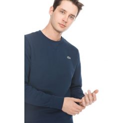 Lacoste Bluza Niebieski. Niebieskie bluzy męskie Lacoste, s, bez wzorów, z bawełny, sportowe, bez kołnierzyka, bez rękawów, bez kaptura. Za 421,95 zł.