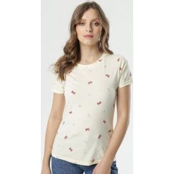 Żółty T-shirt Rhetia. Żółte bluzki damskie Born2be, s, z nadrukiem, z okrągłym kołnierzem. Za 39,99 zł.