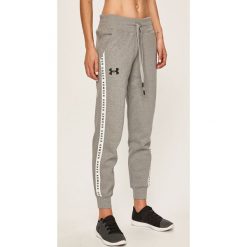 Under Armour - Spodnie. Szare spodnie damskie Under Armour, s, z nadrukiem, z bawełny. Za 229,90 zł.