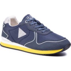 Sneakersy GUESS - Glorym Jr FJ7GLR ELE12 NAVY. Niebieskie trampki chłopięce Guess, z aplikacjami, ze skóry ekologicznej, na sznurówki. Za 349,00 zł.